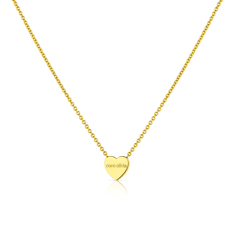 Mama and Me heart pendant with daughters names engraved.
