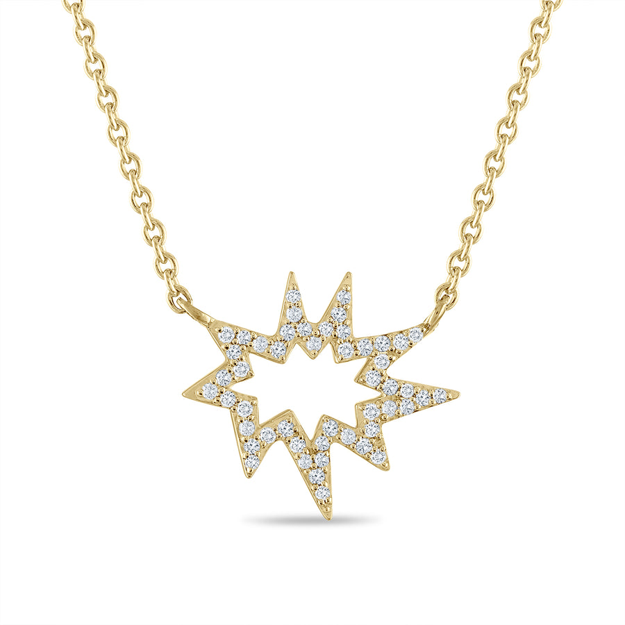 Pavé diamond open star necklace set in 14K yellow gold.