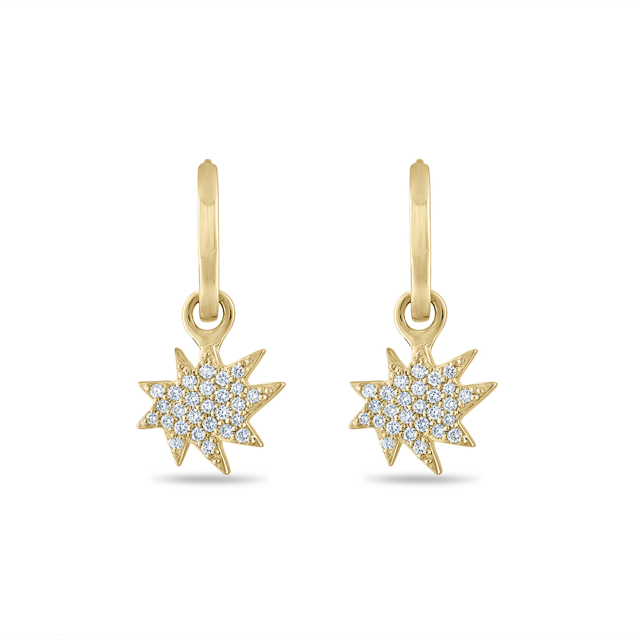 Huggie earrings with mini pave diamond stars in 14K yellow gold.