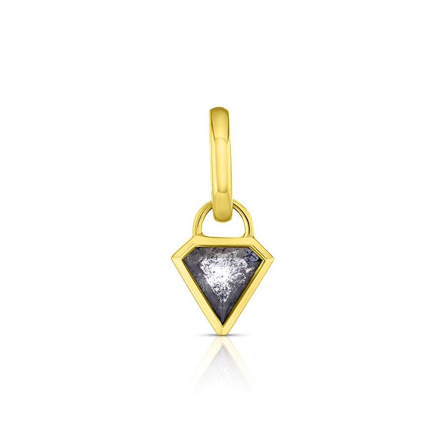 A golden link holding a triangle shaped black diamond charm in a bezel setting.