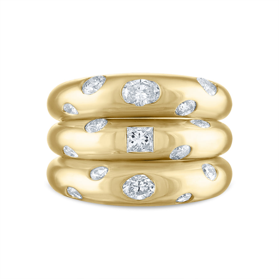 A stack of thin dome rings featuring different diamond shapes