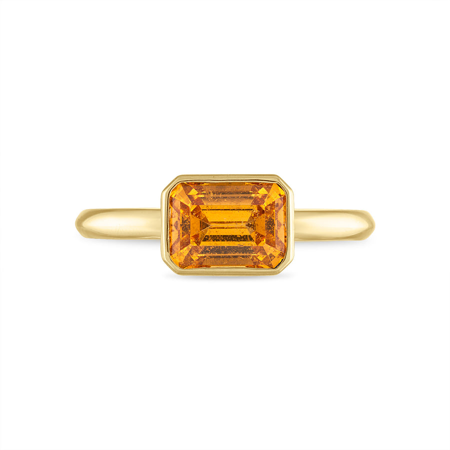 Mandarin garnet ring bezel set in 18K yellow gold.