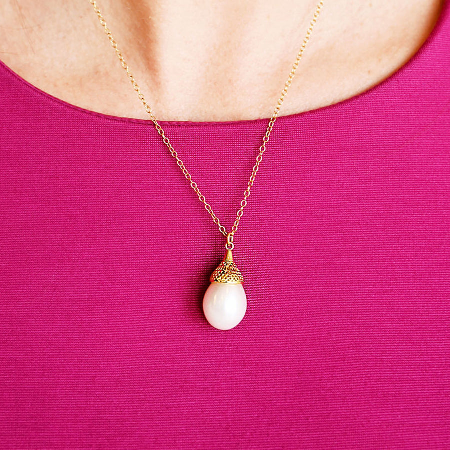 South Sea Pearl Pendant necklace worn on the neck of a woman.