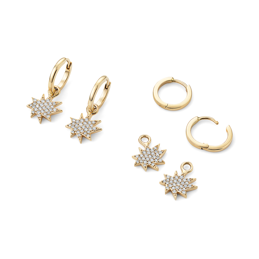 Gold huggie earrings with removable diamond pave charms.