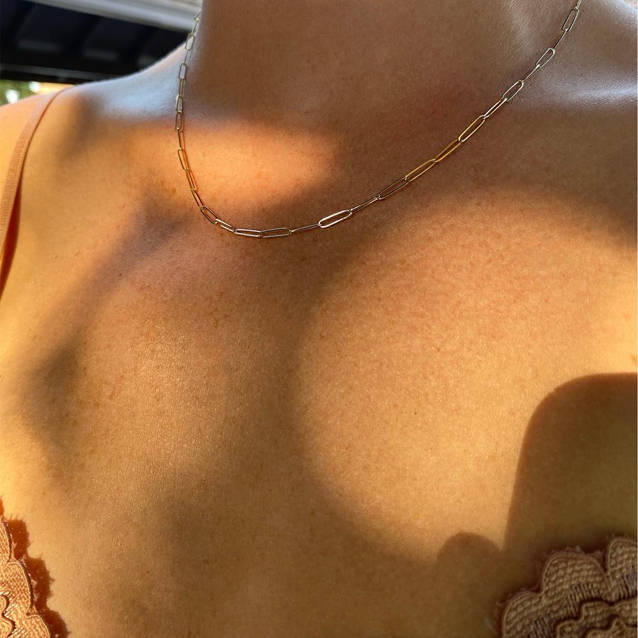 link chain necklace worn by model in 14K yellow gold.