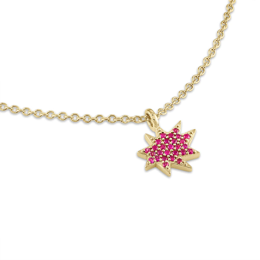 pave ruby star necklace in 14K yellow gold.