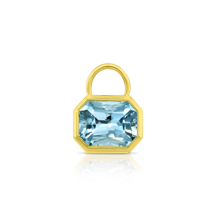 Bezel-set aquamarine charm in 14K yellow gold.