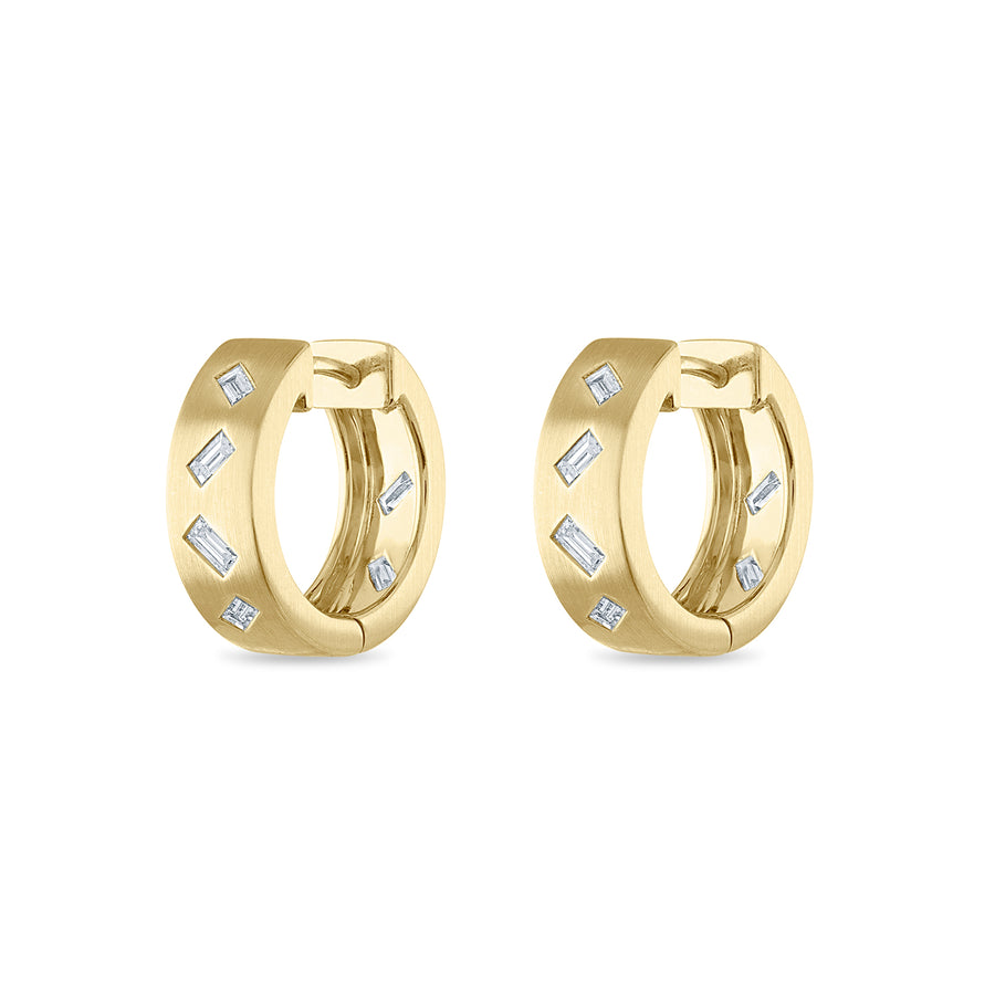 Side view of diamond hoop earrings featuring baguette diamonds.