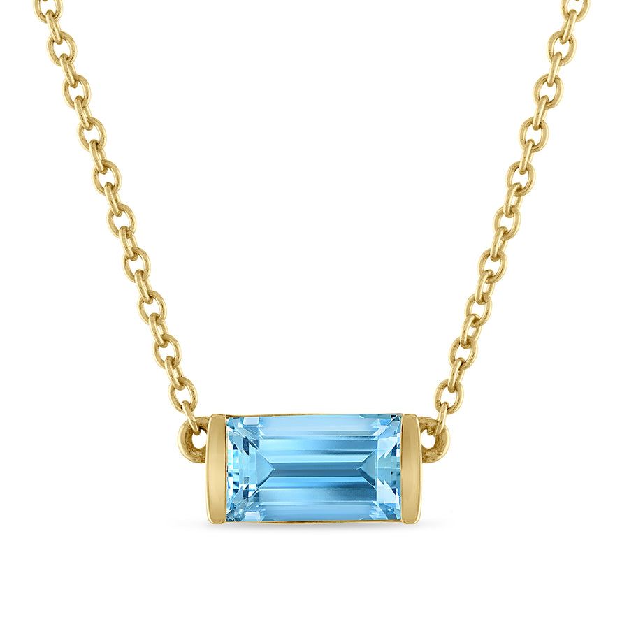 14K yellow gold blue topaz necklace set in an east-west setting.
