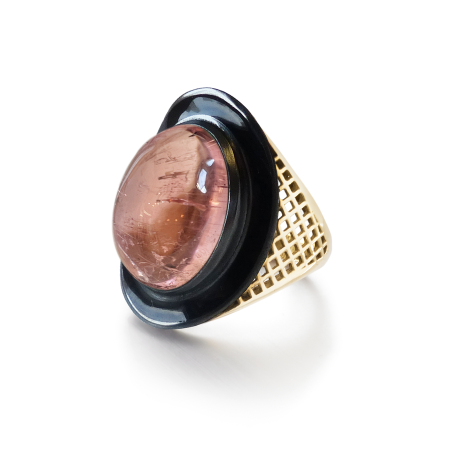 Pink Tourmaline Cabochon Ring with Onyx Surround.